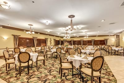 Elegant dining room with tables and chairs