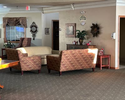 Common area seating with floral decorations