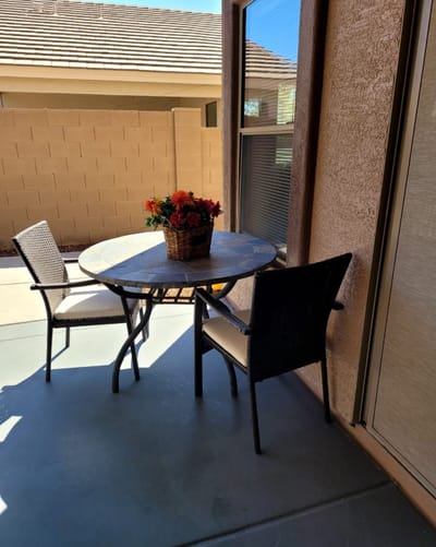 Outdoor patio with a table and chairs
