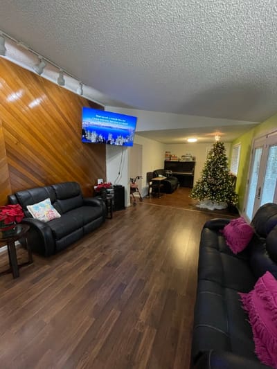 Bright common area with festive decorations and seating