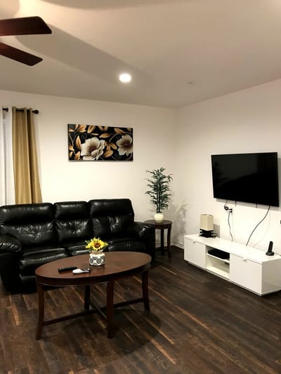 Cozy lounge area with leather seating and decor