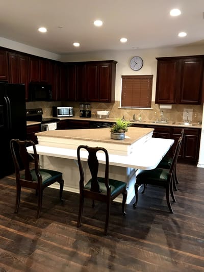 Modern kitchen interior with dark wood cabinets