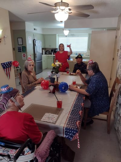 Residents celebrating with food and decorations