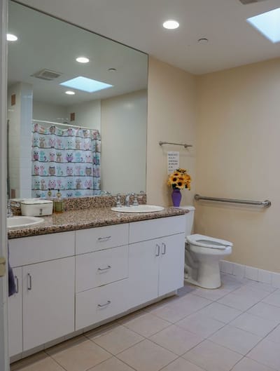 Clean bathroom with modern fixtures and decor.