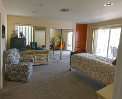 Cozy private resident room with décor and furniture.