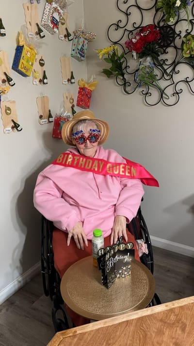 Resident celebrating a birthday with decorations.