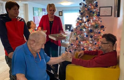 Residents engaging during a festive gathering.