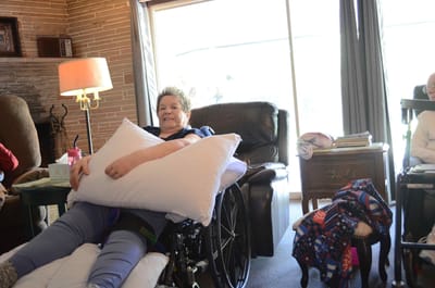 Residents enjoying time together in a cozy living room.