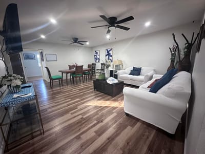 Cozy common area with seating and dining table.