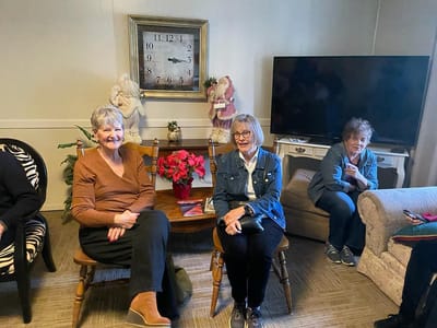 Residents enjoying a gathering in a common area.