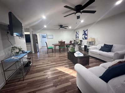Cozy common area with seating and dining table.