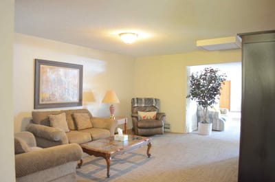 Cozy common area with seating and plants