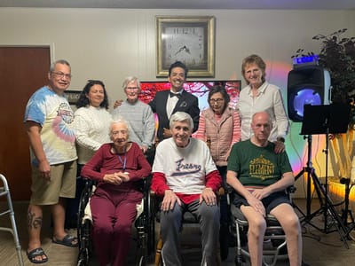 Residents and staff enjoying an event together.