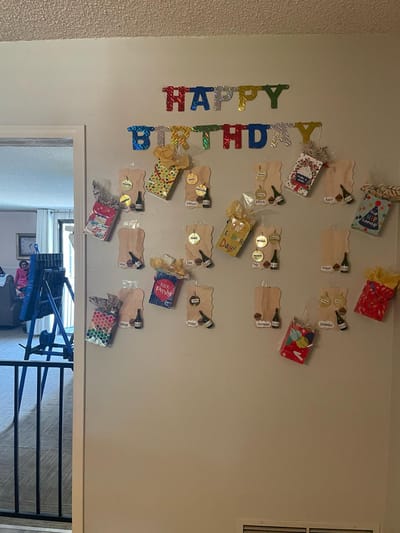 Birthday celebration decorations on a wall