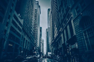Urban street scene with tall buildings