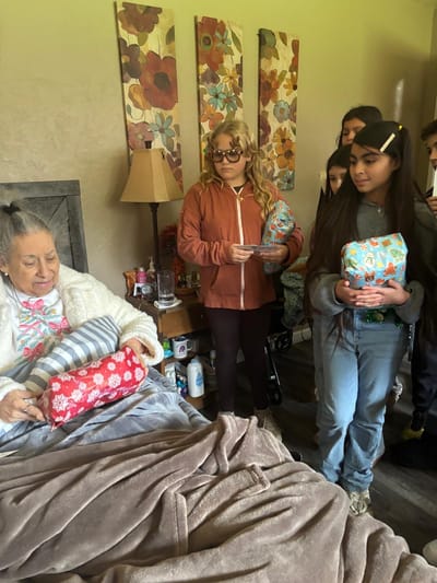 Residents and staff participating in an activity together.