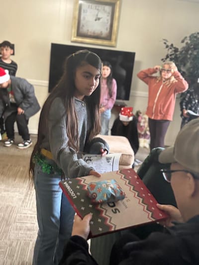 Children participating in a celebration at the facility.