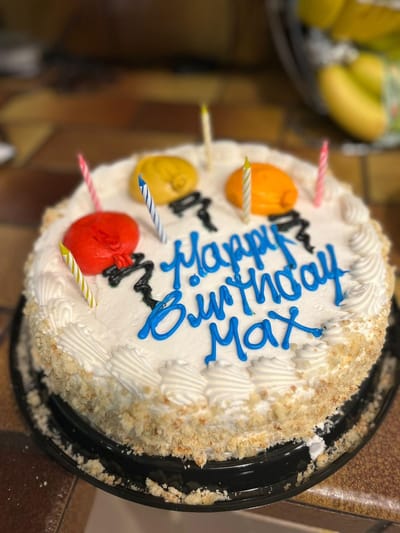 Birthday cake with decorations and candles.