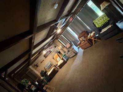Cozy lounge area with seating and decor.