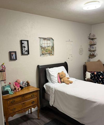 Cozy private resident room with a bed and decor.