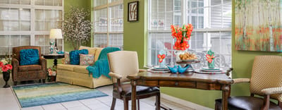 Bright common area with seating and decor