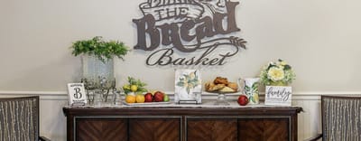 Decorative display in the common area with food and flowers
