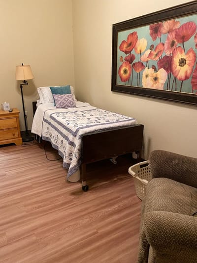 Cozy private resident room with floral decor