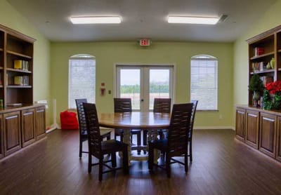 Interior common area with seating and bookshelves