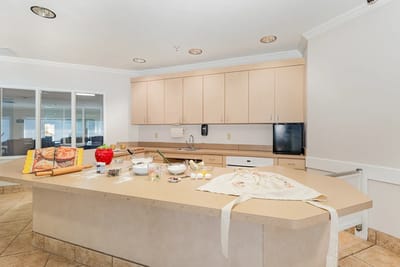 Interior kitchen area with food preparation items