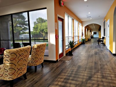 Bright corridor with seating and large windows