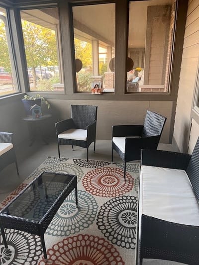 Cozy common area with seating and natural light