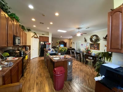 Interior view of a kitchen area with dining tables