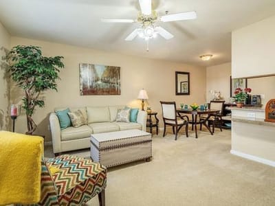 Bright interior of a resident living room with furniture