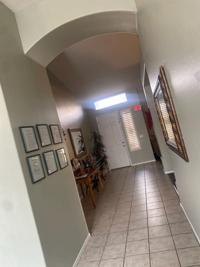 Well-lit hallway in assisted living facility