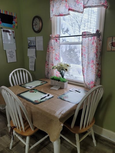 Cozy dining table setting in a facility kitchen
