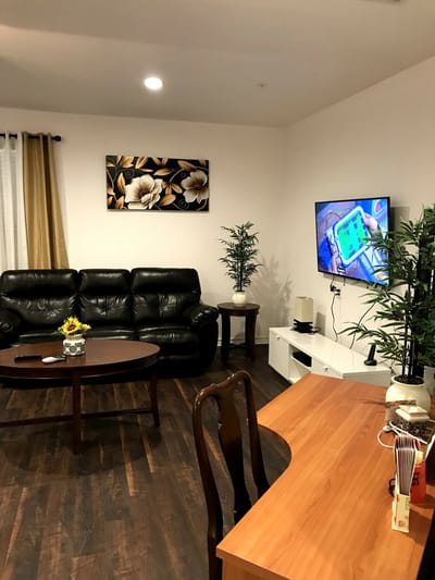 Cozy common area with seating and TV