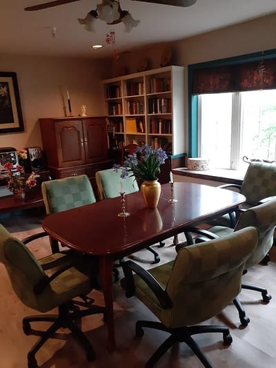Cozy dining area with wooden table and chairs