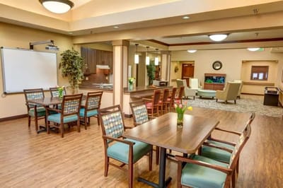 Bright common area with tables and chairs