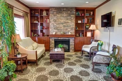 Cozy lounge area with seating and decorative accents