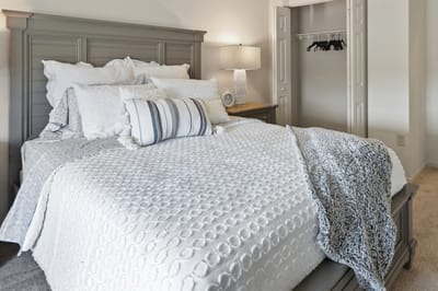 A well-decorated bedroom with a cozy design