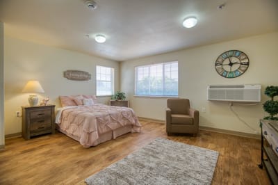 Comfortable private resident room with natural light
