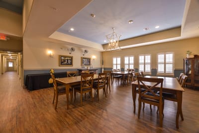 Bright dining room with wooden tables and chairs