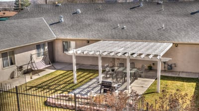 Outdoor shaded seating area in a senior living facility