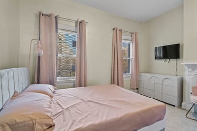 Cozy private room with a bed and dresser