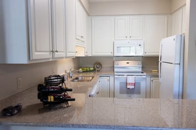 Bright kitchen area with modern appliances