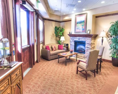 Cozy common area with a fireplace and seating