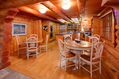 Cozy dining area with wooden features and tables