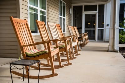 Row of rocking chairs on a porch