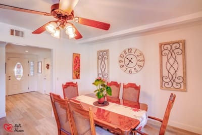 Bright dining room with wooden table and decor