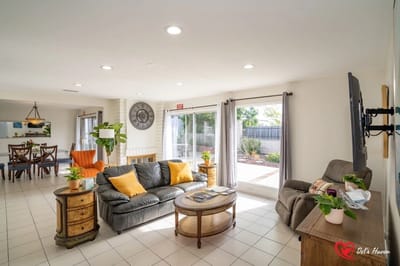 Bright common area with seating and plants